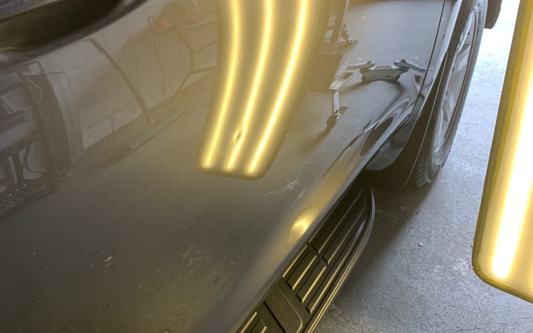 How much does it cost to pop out a dent?